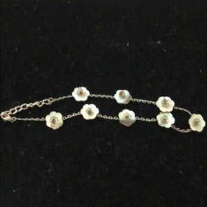 Silvertone bracelet with irredescent flowers